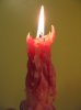 candle-burning-red-pink-white-rivulets-dribbles-of-wax-closeup-1-JR.jpg