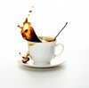 091009-coffee-splashing-from-white-coffee-cup2.jpg