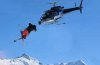 stock-photo-a-helicopter-equipped-with-a-steady-cam-films-a-skier-performing-a-jump-with-crossed.jpg