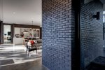 04-black-brick-clad-adds-drama-to-the-decor-750x503.jpg